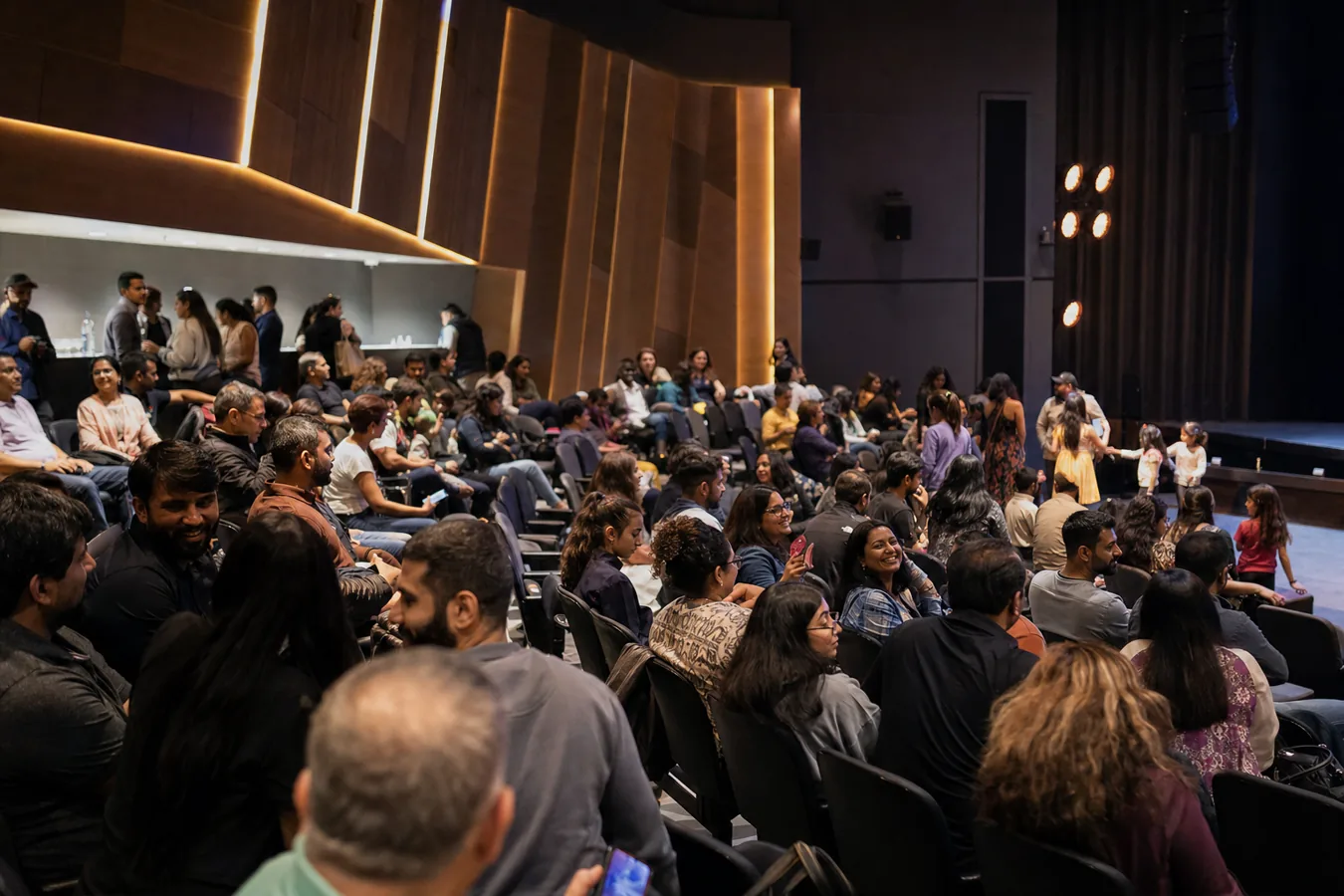 Indian-Australian community members gathering at a cultural performance venue in Australia