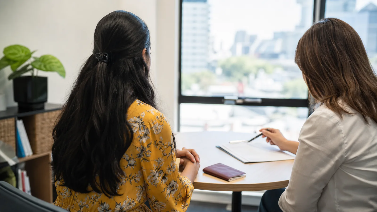 Indian Australian temporary visa holder receiving confidential family violence and migration support at a community legal centre